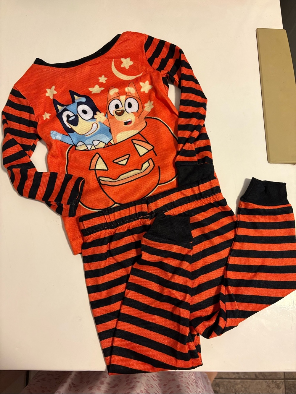 Kids Orange & Black Striped Halloween Pajama Set with Bluey Pumpkin Print